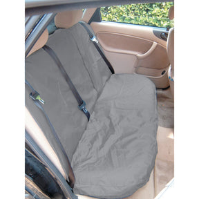 A Sparex Multi-Fit Rear Standard Seat Cover, model S.71707, in a universal fit and gray color is installed on the back seat of a beige car, providing protection for the upholstery. This waterproof cover features slots for seat belts and is washable.