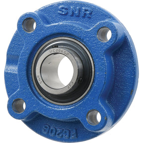 A blue Sparex four-bolt flanged unit (model UCFC208) with visible bolt holes and a center Metric Bearing assembly.