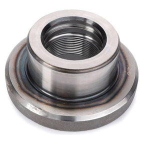 A close-up image of a metallic threaded pipe flange, similar to the components used in Massey Ferguson tractor parts. The circular flange features visible welds and a central threaded hole for connecting pipes, akin to the Nut Pinion Shaft - 3764502M1 by AGCO found on the 2200 Series tractors.