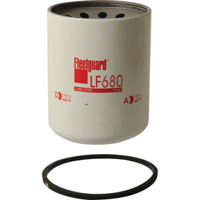 Image of a Sparex Oil Filter - Spin On - LF680 (Sparex Part No. S.76779) with a black gasket ring positioned below it against a white background. This Sparex oil filter is compatible with John Deere machinery, ensuring reliability and performance for your equipment needs.