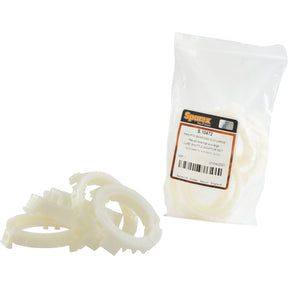 A set of white plastic parts, with some loose on the surface and others in a clear plastic package labeled "PAK-PTO Bearings ECO-Large | Sparex Part No. S.10472".