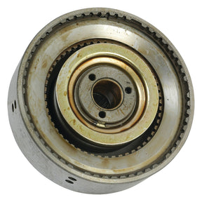 Close-up of a metal mechanical component with circular gears and rings, likely part of an engine or machinery. This item, resembling a Sparex PTO Clutch Pack (Sparex Part No.S.66261), shows signs of use with some discoloration and wear.