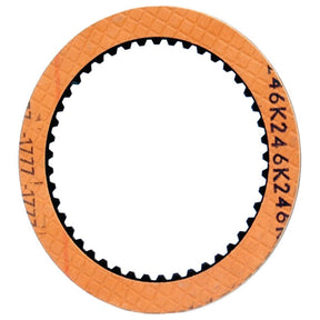 A PTO clutch plate, cataloged as Sparex Part No.S.56973, features a round mechanical design with an orange textured outer ring and black inner teeth. The markings on the outer ring exhibit alphanumeric characters that are characteristic of McCormick's design standards.
