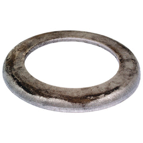 A metal ring-shaped washer with a flat surface and a large central hole, showing signs of wear and rust, reminiscent of an old Sparex PTO Free Wheel Cycle Washer (Sparex Part No. S.4279).