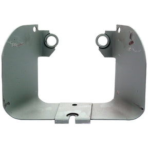 The PTO Guard, Sparex Part No. S.43578 from Sparex, is a gray metal mounting bracket with a design reminiscent of Massey Ferguson parts. It features two circular holes at the top and a rectangular cut-out in the center, along with a slightly weathered appearance.