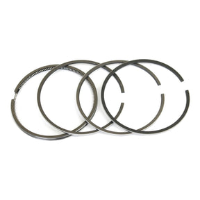 A set of four Perkins metallic piston rings from the Sparex Ring set (Sparex Part No. S.40424) arranged in a line on a white background.