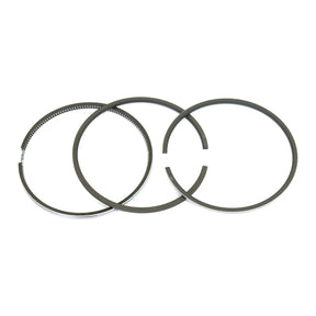 A set of piston rings, specifically the Sparex Piston Ring | Part No. S.41401, featuring three distinct black piston rings arranged in a line against a pristine white background, showcases the quality and precision synonymous with the Sparex brand.