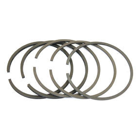 A set of five dark metal piston rings from Sparex, Part No. S.65952, arranged in an overlapping pattern on a white background.