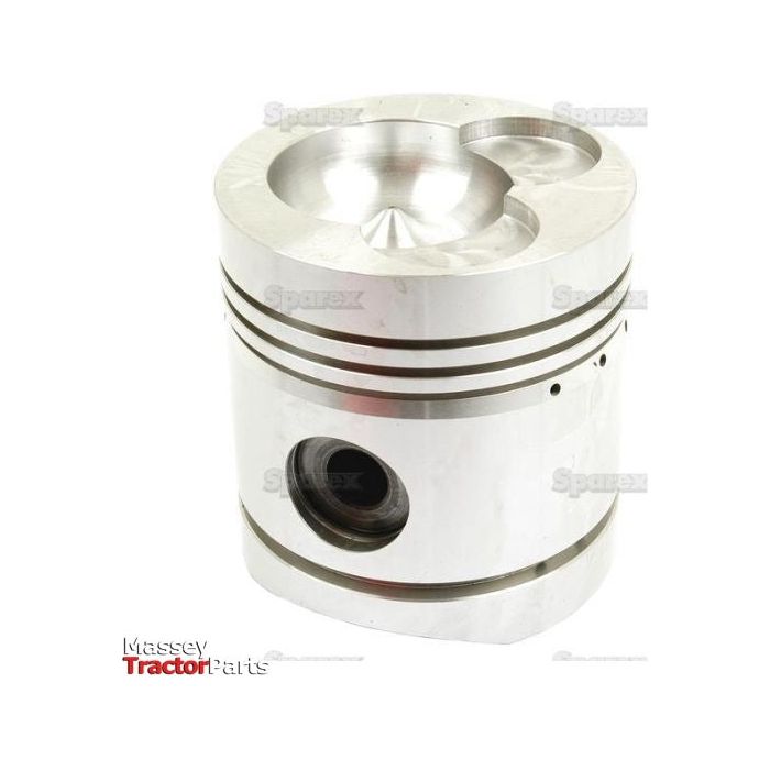 Introducing the Piston (Standard) - S.57506 by Sparex: a silver metallic piston featuring multiple indents and grooves, a cylindrical shape with a central hole on one side, and optimized compression height for enhanced performance. Displayed against a white background.