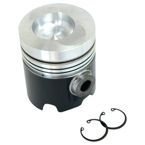 A Sparex Standard Piston (S.58898) made of metal, showcasing three visible grooves and a side hole, with a precise bore diameter and accompanied by two circular piston rings on a white background.