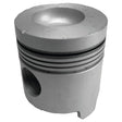 The Sparex Piston (Standard) - S.66313 is displayed, featuring a silver metallic finish and characterized by its multiple grooves and central concave indentation. This cylindrical-shaped piston includes a hole on one side, a notch at the base, and boasts an optimized compression height for enhanced performance.