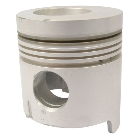 The Sparex Piston (Standard) - S.66601 is a metallic component with grooves, a central convex surface, and a circular hole on its side, designed for optimal compression height.