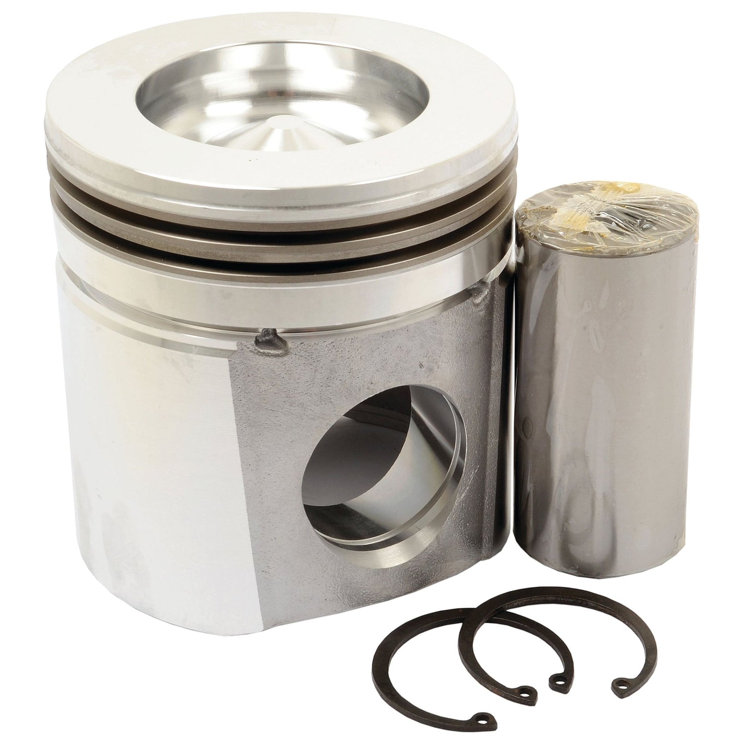 A **Sparex Standard Piston (S.67975)**, complete with rings and a cylindrical wrist pin beside it, prominently showcasing its precise bore diameter against a plain white background.