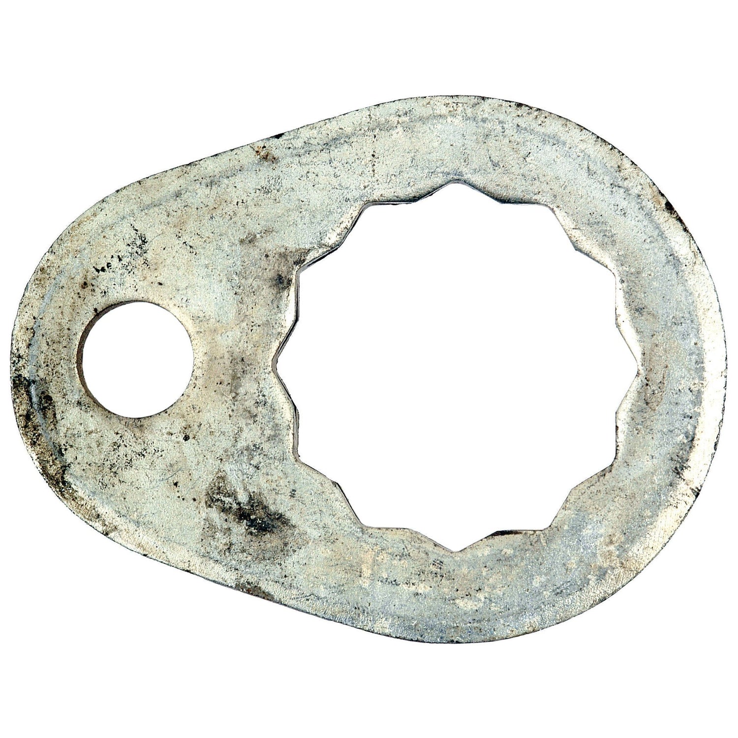 The Pivot Pin Washer, identifiable as Sparex Part No. S.60465 from the Sparex brand, is an oval-shaped metal washer possibly used for Ford New Holland machinery. It features a circular hole on one end and a scalloped edge hole on the other. The surface appears worn and corroded.