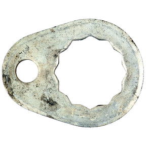 The Pivot Pin Washer, identifiable as Sparex Part No. S.60465 from the Sparex brand, is an oval-shaped metal washer possibly used for Ford New Holland machinery. It features a circular hole on one end and a scalloped edge hole on the other. The surface appears worn and corroded.