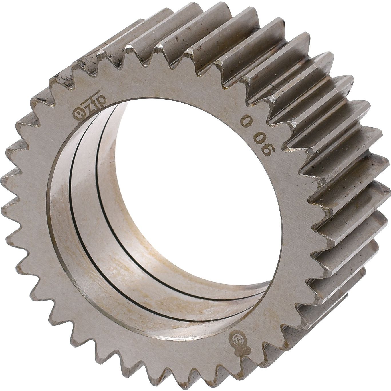 A detailed image of the Sparex Planetary Gear (Sparex Part No. S.67997) with straight teeth and a central hole, reminiscent of a component in John Deere machinery.