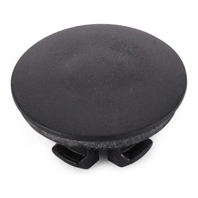 The Massey Ferguson - Plug - 3713742M1 by AGCO is a black plastic rivet designed for use in Massey Ferguson 2WD and 4WD vehicles. It features a circular flat head and bottom clips, shown against a white background.