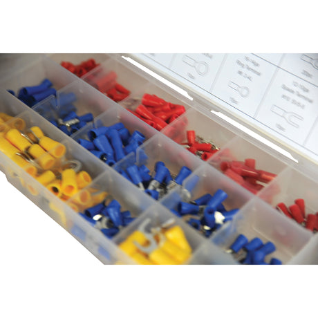 The Sparex Pre Insulated Terminal Kit, Standard Grip Assorted (Handipak 260 pcs.) | Sparex Part No. S.29904 includes a plastic box with compartments containing red, blue, and yellow assorted connectors. The lid features diagrams and labels for each type of connector, making this kit incredibly user-friendly.