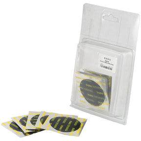 Clear plastic packaging containing 55mm black adhesive-backed round tube patches, with several loose patches in front, branded under Sparex REPAIR PATCH-TUBE-55MM A'PAK (Sparex Part No. S.21213).