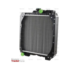 A black and silver radiator with green caps, designed for use in Massey Ferguson tractors and compatible with Case IH / International Harvester models, is displayed against a white background. The item is labeled "Radiator - S.127955" from the brand Sparex.