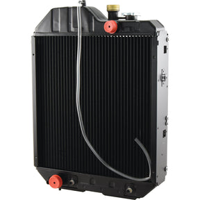 The Sparex Radiator - S.140963 is a vertical, black automotive radiator with red and brass fittings and a silver cap. It features a series of fins and multiple attachment points, making it suitable for various vehicle models.