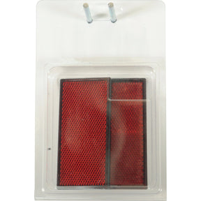A pair of Rectangular Reflector (Self Adhesive) Red 2 pcs. Agripak from Sparex, secured in a clear plastic casing with a hang tab, part number S.14441.