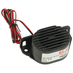 The Sparex Reversing Alarm Night-Silent - S.20988 is a small black electronic audio device with red and black wires attached, featuring a label marked "BA-32" and technical specifications of 90 dB(A) at 12/24 Volt. This unit is waterproof, ensuring reliable performance in various conditions.
