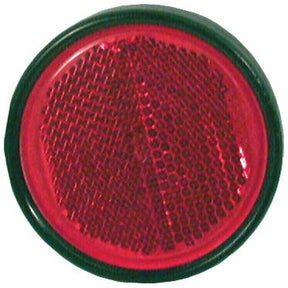 Close-up of the Round Reflector (Sparex Part No.S.35888) by Sparex, featuring a round, red center with a black border and a 90mm diameter, showcasing a textured surface with small hexagonal patterns.