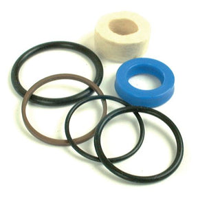 A Seal Kit for early type steering rams, including assorted O-rings and a roll of thread seal tape, arranged on a white background – ideal for maintenance needs, including Massey Ferguson steering rams. Available as Sparex Part No. S.40133, from the trusted brand Sparex.