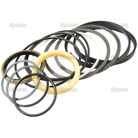 Several rubber seals and O-rings of varying sizes are scattered, overlapping each other on a white background, resembling the Seal Kit (Dip Stick), Sparex Part No.S.41282 for a Massey Ferguson assembly by Sparex.