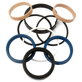 Assorted rubber and fabric rings of various sizes and colors, arranged in a circular pattern on a white background, reminiscent of precise components in a Sparex Seal Kit (Steering Cylinder 2WD & 4WD depending on tractor models) | Sparex Part No.S.41992.