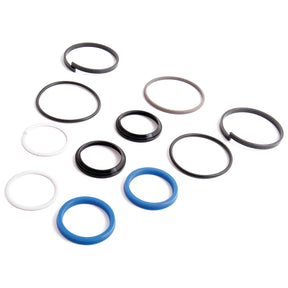 Various O-rings and seals of different sizes and colors, including black, white, and blue, for Carraro and Ford/New Holland Steering Cylinder 4WD systems are displayed on a white background. Specifically, this assortment includes the Seal Kit (Steering Cylinder 4WD) by Sparex, identified by Part No.S.7827.