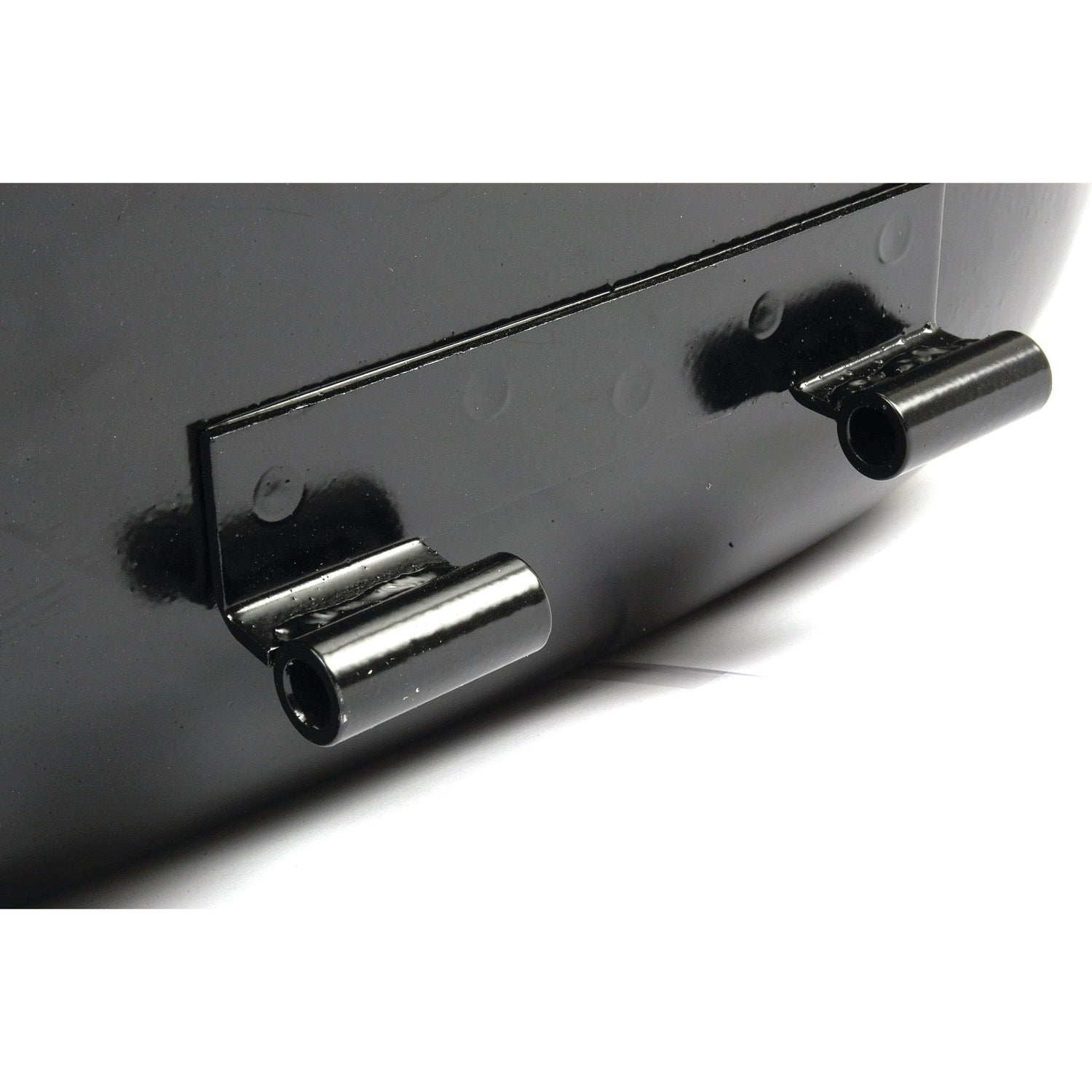 Close-up of two black cylindrical metal hinges attached to a flat black surface, resembling components found in the Sparex Seat Assembly (Sparex Part No. S.61144).