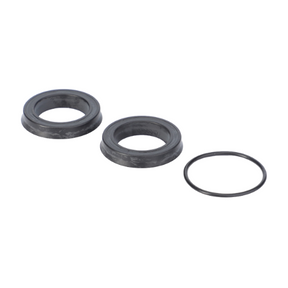 Two black gaskets and one black O-ring, components of the AGCO Massey Ferguson Slave Cylinder Repair Kit (model number 1810917M94), arranged in a row on a white background.