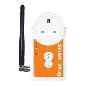 This image shows a Sparex SmartPlug Luda (UK) - S.162405 remote power switch with an attached antenna. The device is white with an orange panel displaying "Smart Plug" and features a power button in the center, perfect for seamless remote control in smart farming applications.