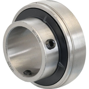 A detailed view of the Sparex Plummer Block Bearing Insert (UC210) - S.18436, branded with labels UC210 and BC18606, showcasing a cylindrical center and a locking set screw on one side. This metric bearing insert is engineered for precision and reliability.