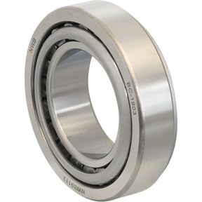 A metal cylindrical taper roller bearing with engravings "Sparex" and "S.54432" visible on the outer ring.