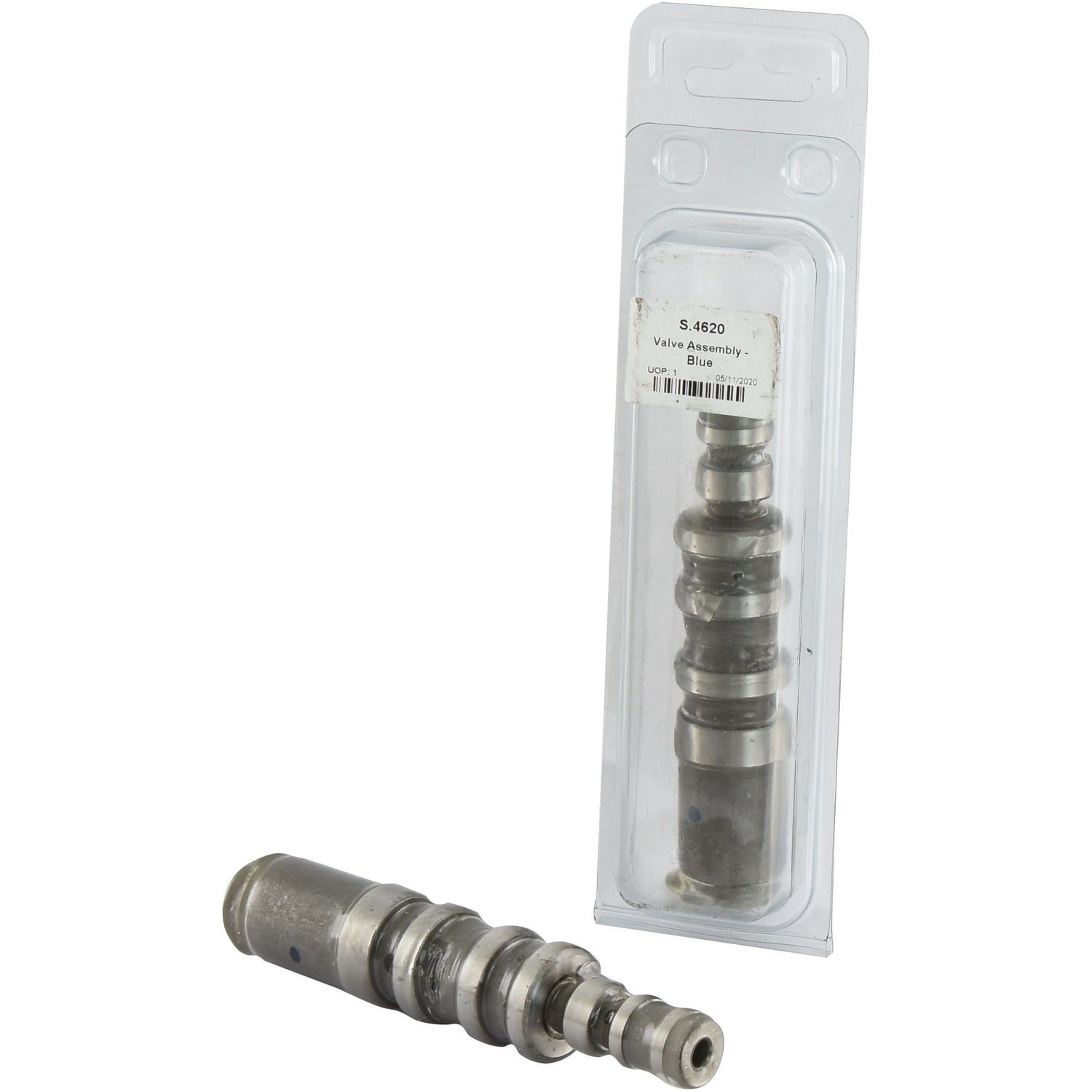 A metal Valve Control Assembly - Blue (Sparex Part No. S.4620) is displayed in protective packaging, with another identical Sparex assembly positioned in front of the package, perfect for Ford/New Holland machinery.