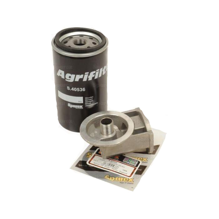 A black Spin On Filter Assembly with Filter Head (Sparex Part No. S.40533), a metallic adapter, and a packaging label are displayed against a white background with the Sparex logo faintly visible, showcasing its compatibility with Sparex Perkins Cartridge Filter Assemblies.