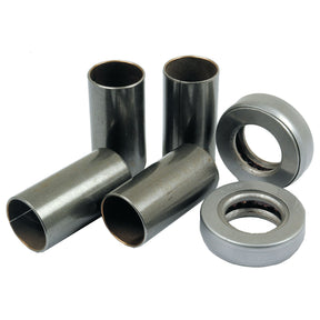 Metal cylindrical bushings and two metal ring bearings, components of the Spindle Repair Kit | Sparex Part No.S.57754 from Sparex, are arranged with some standing upright and others lying on their sides.