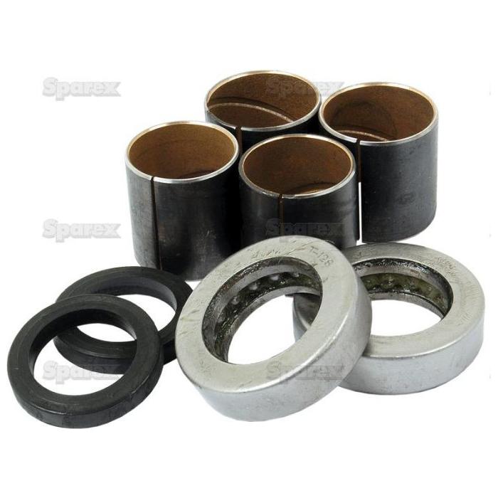 Image of industrial bushings and bearings with cylindrical and circular components, some made of metal and some with rubber elements, arranged in a cluster. The Spindle Repair Kit (Sparex Part No. S.65106) by Sparex is compatible with Ford / New Holland machinery, making it ideal for anyone working on a spindle repair project.
