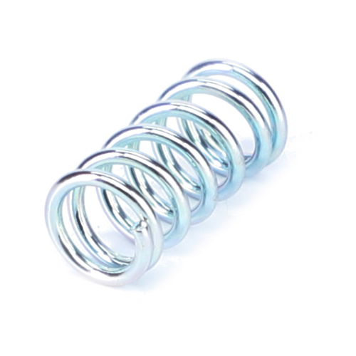 A close-up view of the AGCO Massey Ferguson - Spring Headlight (3771550M1), a small, coiled metal spring with a shiny silver finish against a plain white background, designed for use in Massey Ferguson tractor parts.