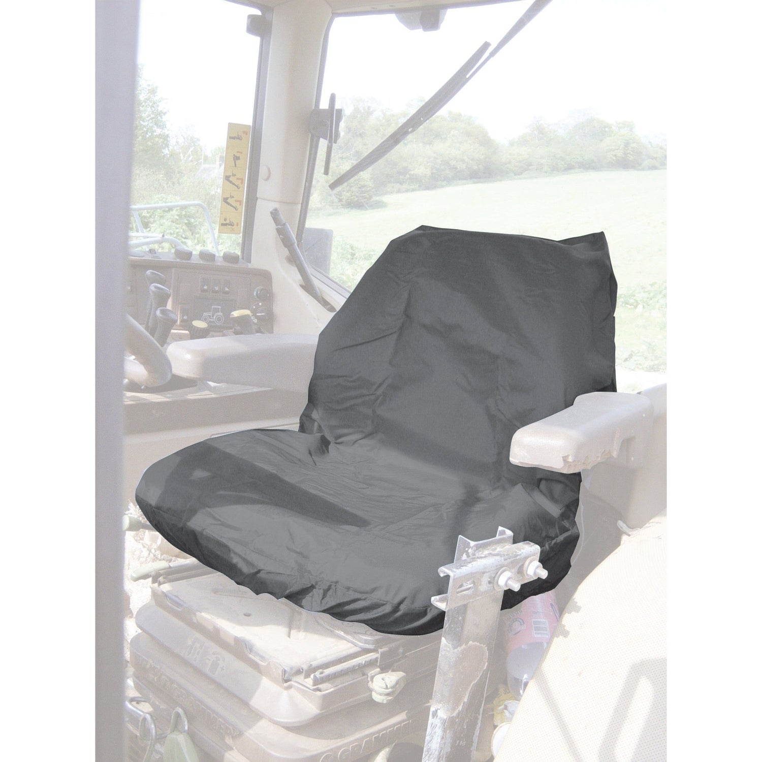 The Standard Seat Cover - Tractor & Plant - Universal Fit - S.71719 by Sparex is shown on a tractor seat in a vehicle interior. Adjacent controls and a window offering an outdoor view are visible. The cover is black, waterproof, and washable for easy maintenance.