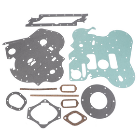 A Massey Ferguson - Sump Gasket Kit - 4224142M91 by AGCO, featuring a variety of gaskets and seals made from rubber, cork, and composite materials, displayed on a white background.