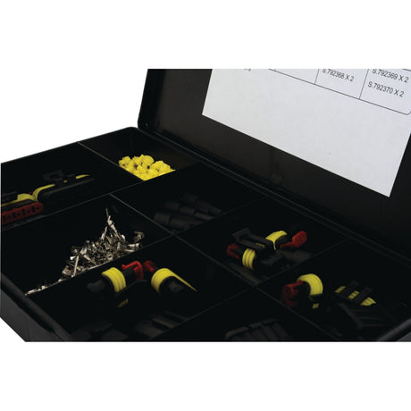 The Assorted Superseal Block Connectors (Handipak 228 pcs.) - S.792379 from Sparex is a black organizer box with multiple compartments that holds an assortment of 228 pieces of small hardware items, including plastic connectors, yellow caps, and metal fasteners.