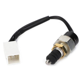 The AGCO Massey Ferguson - Switch Cab Door Light - 4293575M1 is a black and silver switch featuring a plastic connector and wire for electrical connection, specifically designed to be compatible with Massey Ferguson series tractors.