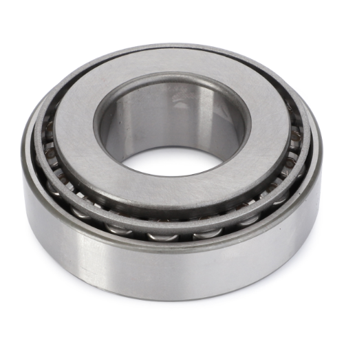 A close-up image of the AGCO Massey Ferguson - Swivel Bearing Final Drive (Part No. 3310930M91) shows a cylindrical roller bearing with a central hole and multiple cylindrical rollers arranged around the perimeter, all featuring a metallic finish. This bearing is used in Massey Ferguson 1000 Series tractor parts.