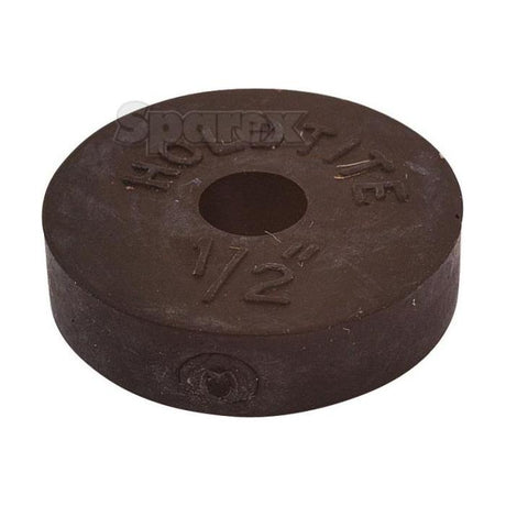 Close-up of a round, black rubber spacer with a central hole and "1/2" embossed on the surface, reminiscent of the TAP WASHER-1/2'' (Sparex Part No. S.4453). The brand name "Sparex" is faintly visible in the background.