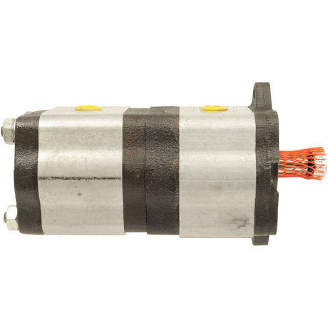 Image of a Sparex Tandem Hydraulic Pump - S.43590 with a silver and black metallic body. Copper wires are visible from one end, indicating clockwise pump rotation.