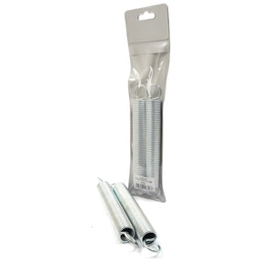 Two metal tension springs from the Sparex brand (product number S.26323), one lying flat and one standing upright, with a pack containing additional Ø29mm Tension Springs (2 pcs. Agripak | Sparex) in the background.